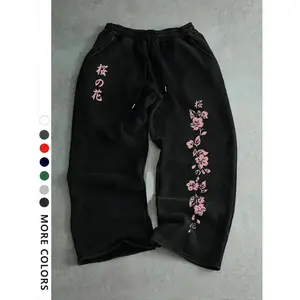 Men’s casual sports pants with cherry blossom print, drawstring, wide leg, loose fit; all-season comfortable men’s clothing; athleisure-style bottoms