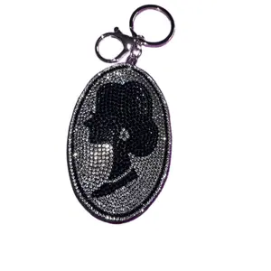 Elegant Lady Rhinestone-Accented Bag Charm or Keychain, Silver-Tone Hardware, Shiny Finish, Sparkling Fashion Accessory