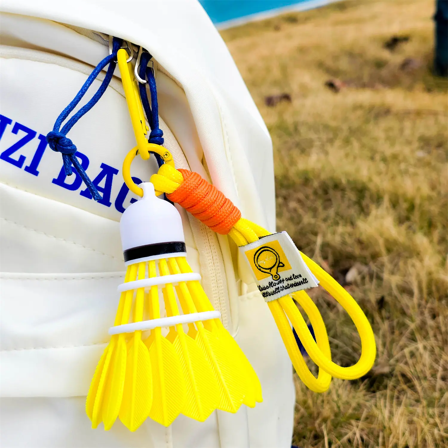 Yellow badminton + lanyard