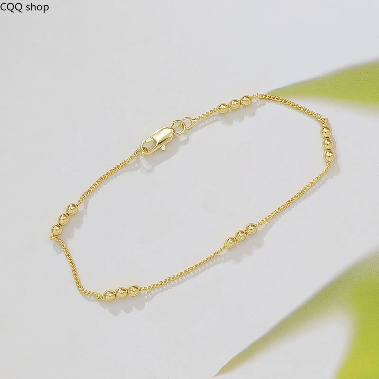 Minimalist Smooth Beaded Bracelet, thin round ball link chain. Classic basic hand jewelry with luxury subtle style, versatile accessory for daily outfits and layering looks