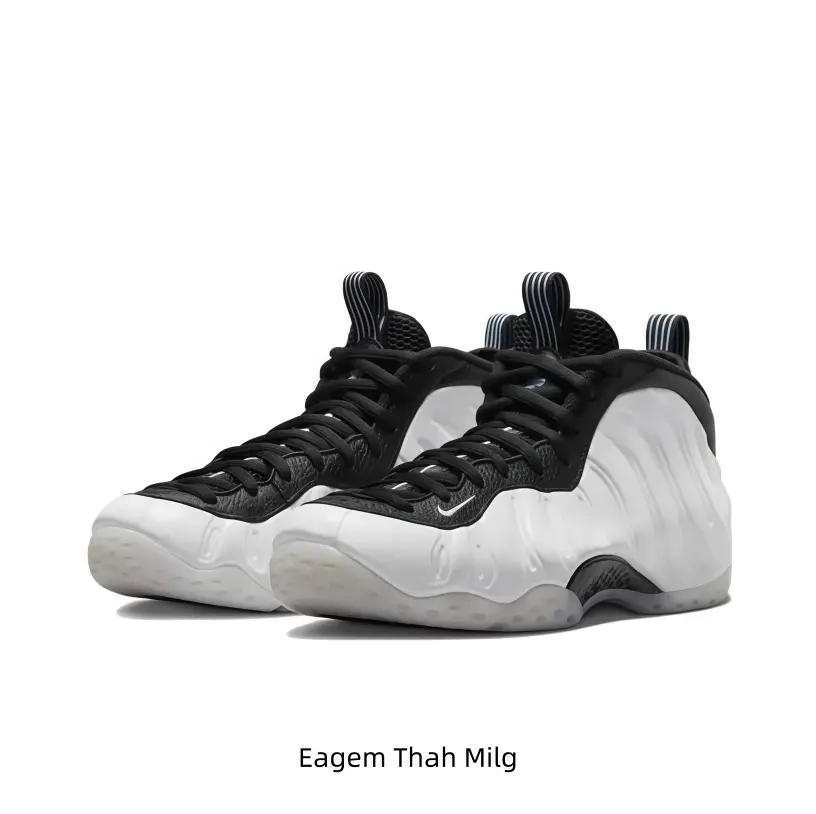 Trendy two-tone white-black foam mid-top athletic kicks adopt unique sculpted curved silhouette, soft padded black ankle lining and translucent segmented sole offering lightweight shock absorption for all-day walking