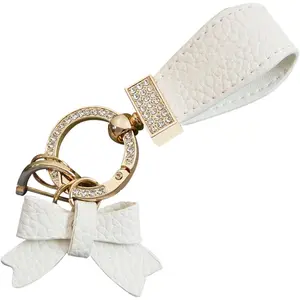 1 PC Bling Car Bow Leather Keychain, Rhinestone Keychain Decoration, Universal for Car Handbag Pendant (Gold & White)