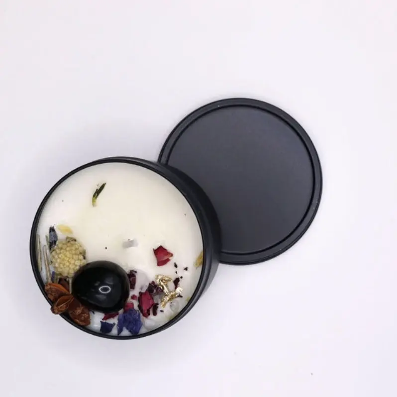 Moon Phase Intention Candles     Yule Moon Candle Obsidian or Moonstone • Star Anise • Rosemary • Rose Petals • Gold For protection, grounding & winter blessings.