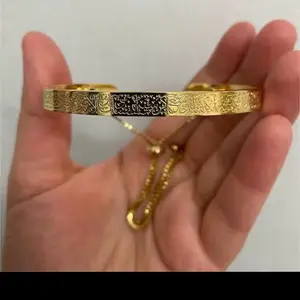 Arabic Bracelet with Black & Gold Design and Decorative Elements