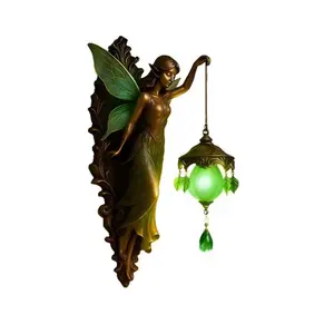 A Beautifully Designed Vintage Wall Lamp Featuring Fairy Wings, Perfect for Creating a Soft and Dreamy Atmosphere in Bedrooms, Dining Areas, Hotels