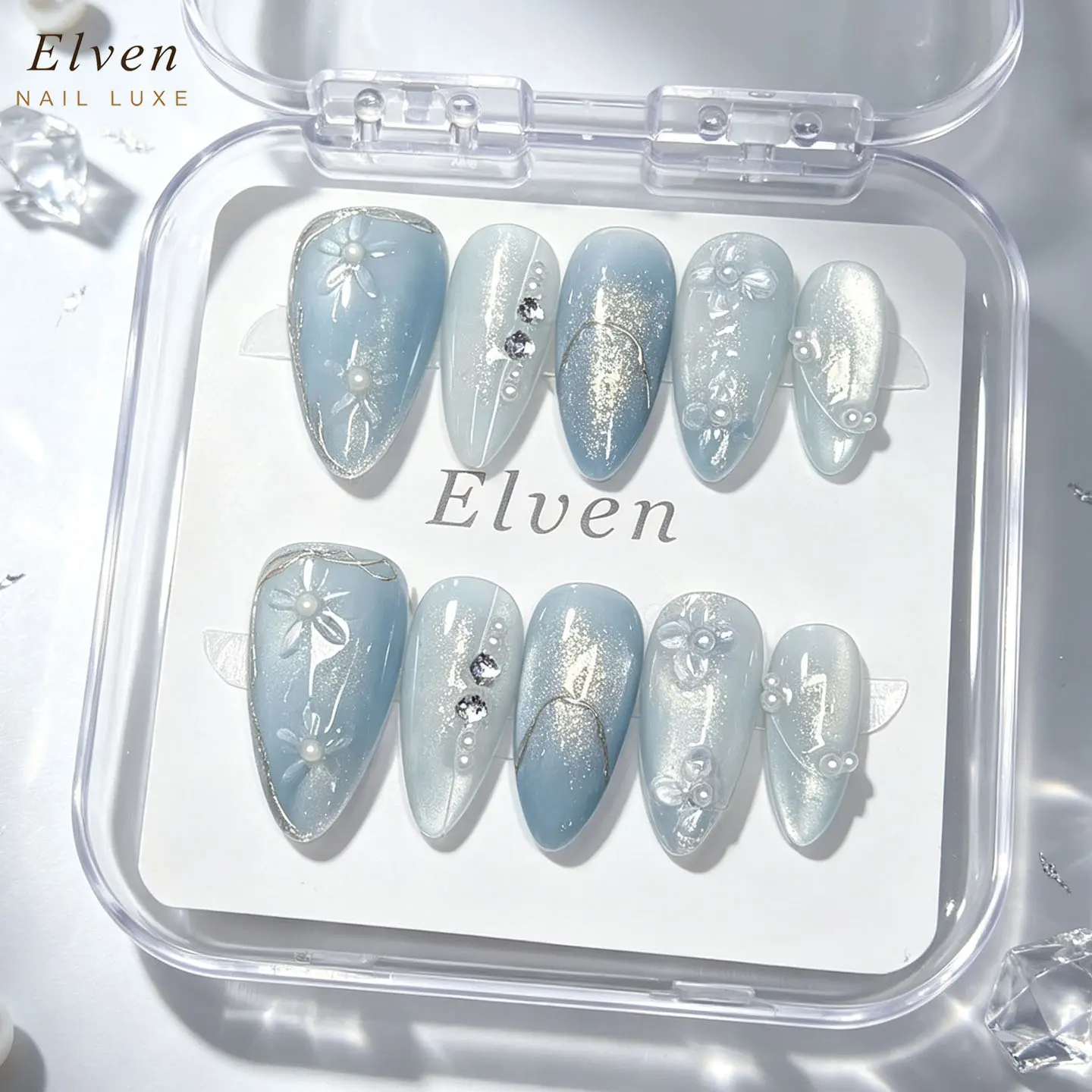Handmade Light Blue Ombre Cat Eye Press On Nails With 3D Flowers, Gold Foil, Pearls & Black Crystal Accents, Medium Almond Reusable Fake Nails For Dreamy Elegant Wear