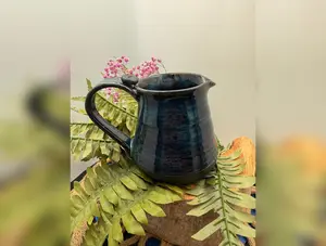 Stoneware coffee creamer/ syrup pitcher hand made pottery.