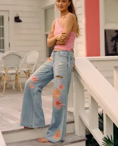 Dreamy Drape Stretch Super Low-Rise Baggy Flare Jean with Floral Print 5-Pocket Denim Style Zero Waistband