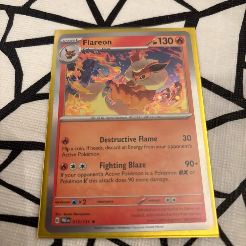 Flareon Pokemon TCG Card with Destructive Flame and Fighting Blaze Abilities 013/131