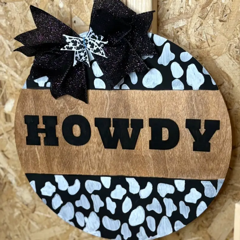 Howdy Door Hanger - Black and White Patterned Design with Bows - "HOWDY" Text on Wooden Backing - Unique Decorative Door Accessory Hanging Decoration