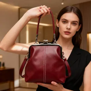 Women's Crossbody Bag in Four Colors: Black/Red/Brown/Green. Mini Crossbody Bag with Kiss-Lock Closure, Adjustable Strap, and Detachable Top Handle. Compact Bag for Daily and Formal Occasions. This Elegant Red Women's Bag is a Versatile Accessory Casual T
