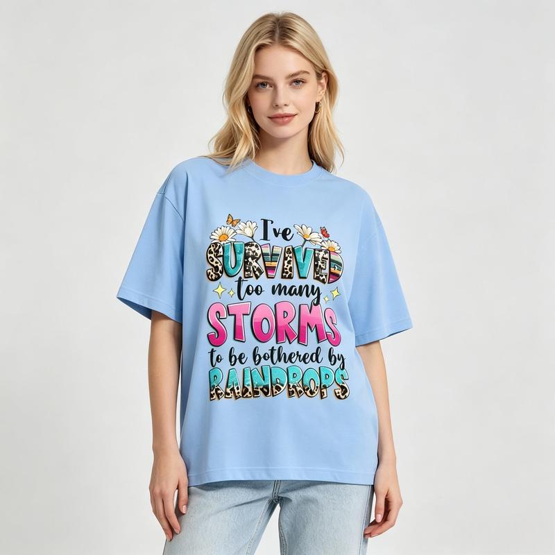Women's Pure Cotton Crew Neck Short-Sleeve Oversized Y2K Sohochic Summer Aesthetic Graphic Print Tee - Viral Trending "I've Survived Too Many Storms To Be Bothered By Raindrops" Design, Loose-Fit, Lightweight Positivity Gift for Business Women