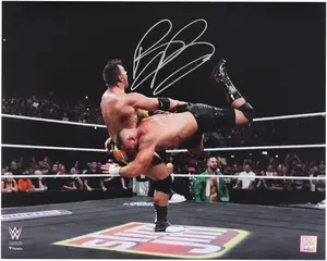 Bron Breakker WWE Autographed 16" x 20" Spear On LA Knight Photograph - Fanatics Authentic Certified