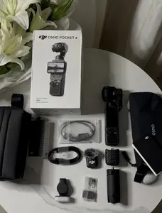 DJI Osmo Pocket 4 Creator Combo (ALL ACCESSORIES INCLUDED)