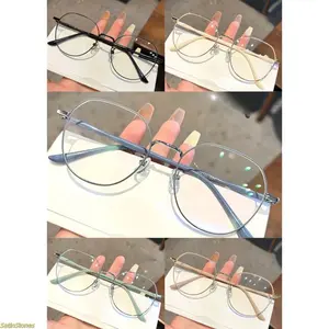2026 Trending Style: Women's Fashionable Blue-Light Blocking Glasses. Featuring a streamlined metal frame and flat lenses, these glasses are lightweight and comfortable—perfect for daily wear and screen use—allowing you to enjoy a truly modern and comfort