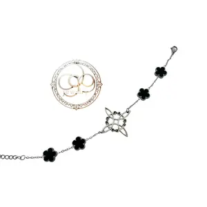 VC witch knot and onyx flower, silver bracelet