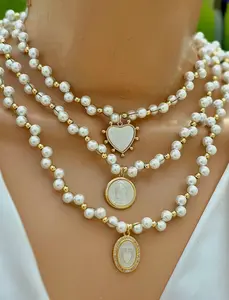 18k gold plated and Pearls Heart, Lady of Guadalupe and sacred heart necklaces