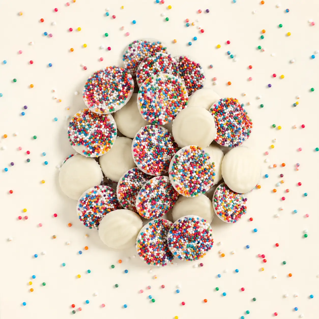 White Chocolate Nonpareils – Rainbow Sprinkle Discs