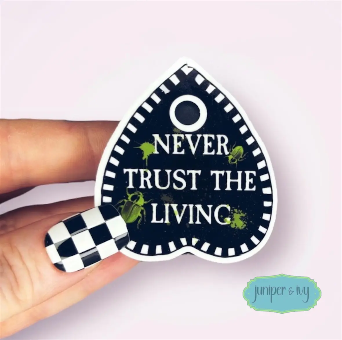Never trust the living planchette shaped phone grip