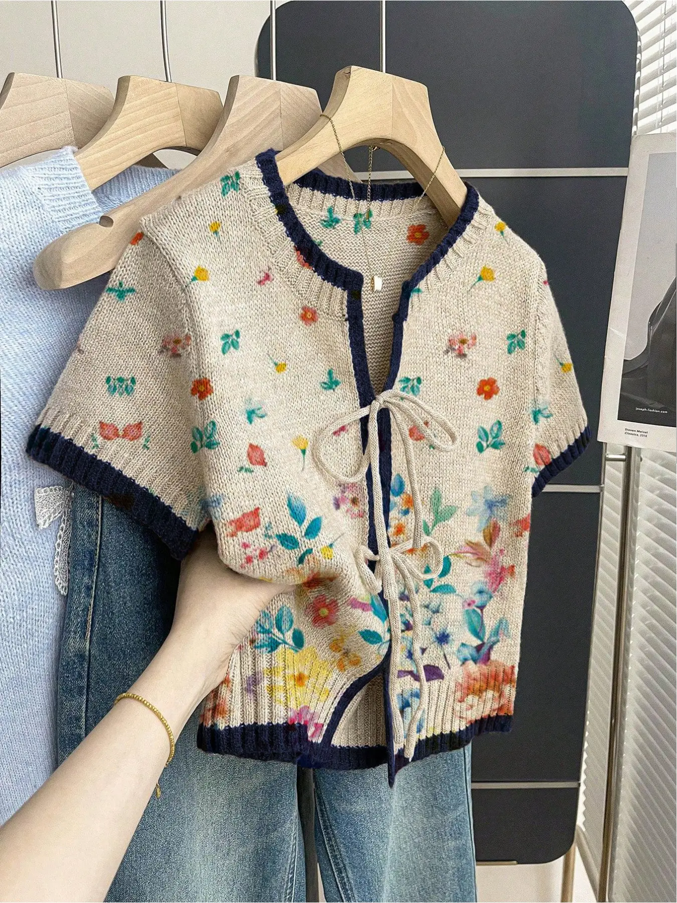 Women's khaki bohemian vacation short-sleeve knit top. Loose round neck, contrast floral print, front tie and contrast piping. Comfortable for spring & summer casual wear Womenswear.