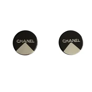 Pre-owned Chanel vintage black and silver logo clip on earrings authentic with COA