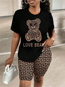 Women’s 2-piece casual Fashion set featuring a short-sleeved T-shirt with a lettered bear print and fitted shorts, designed for summer outdoor activities