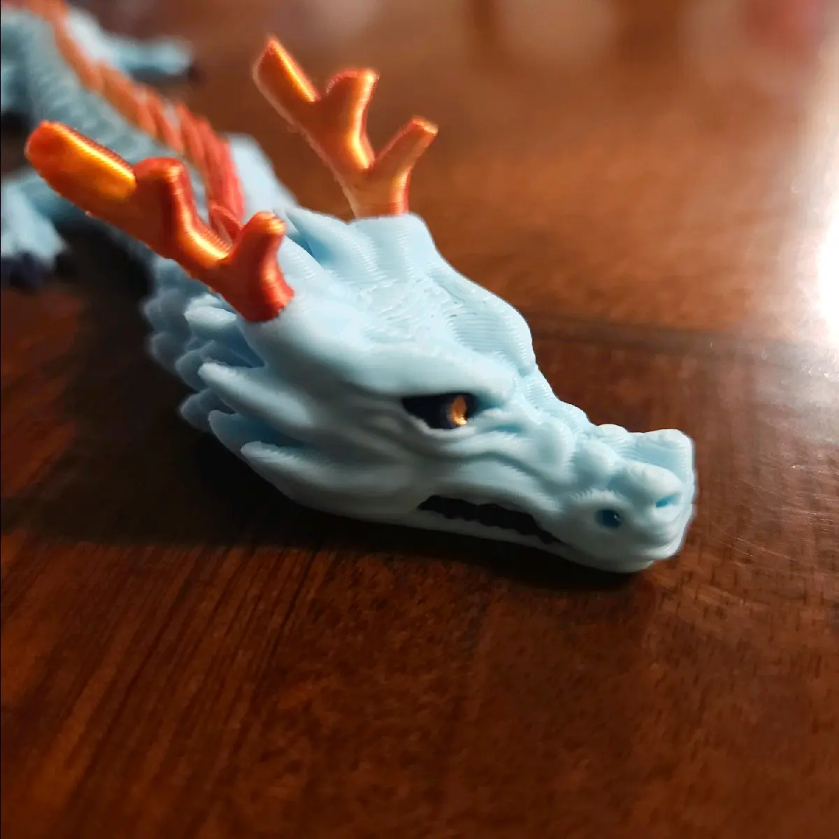 14" 3D printed articulated dragon- Light blue and red/organge spikes