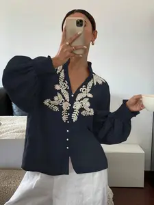 A new V-neck solid color heavy industry embroidered pearl single-breasted lantern long-sleeved top Blouse