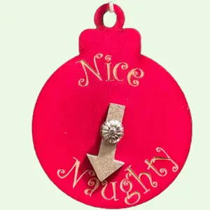 Christmas ornament Laser-engraved wood Naughty or Nice spinner Handcrafted decor Holiday gift Festive decoration Unique Christmas gift Arrow spinner ornament Personalized wood ornament Seasonal keepsake