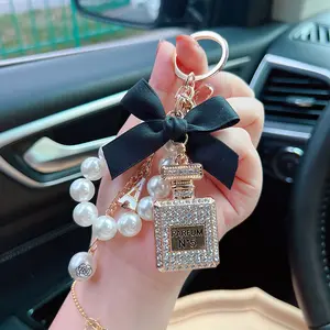 Leshanxing 2Pcs Coquette Aesthetic Perfume Bottle Charms | Y2K Rhinestone Keychain with Pearl Strap | Matching Bestie Gift for Bags & Phones