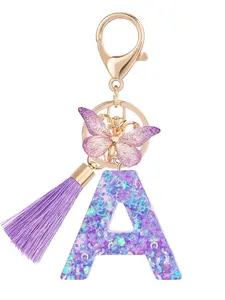 1pc/Initial keychain accessories key rings Creative pink letter keychain Hollow heart sequin butterfly tassel key chain Bag hanger accessories - Gift of choice