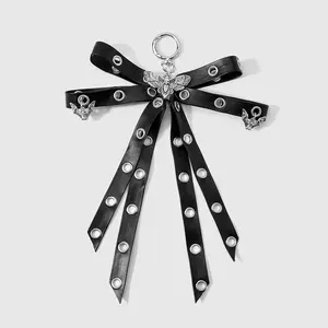 1 piece Y2K trendy retro punk dark gothic black leather keychain/bag charm featuring metal accents, stars, studs, double layers, bow details, and bat decorations; DIY design; suitable for girls’ everyday wear and as a holiday gift.
