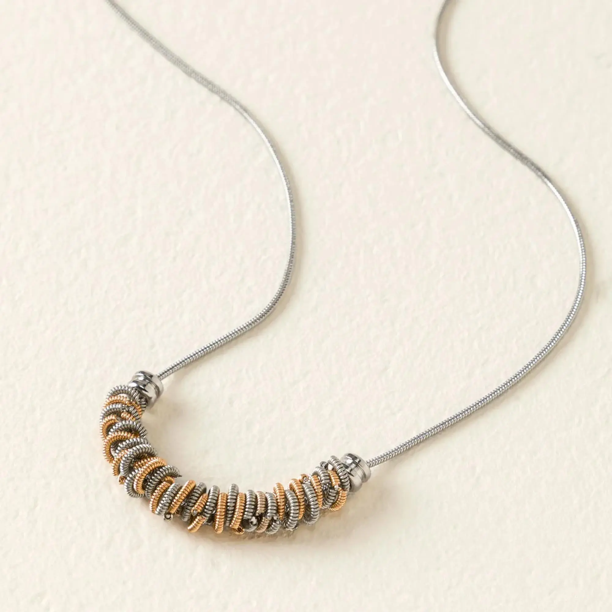 Guitar String Fidget Necklace by High Strung Studios Guitar String Fidget Necklace by High Strung Studios
