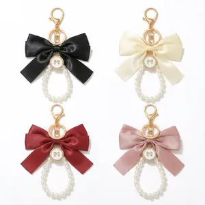 Harkapy 4-Pack Bow Faux Pearl Keychain Elegant Satin Bowknot Bag Charm Metal Key Ring Accessory for Car Keys Handbags Backpacks Women's Fashion Gift