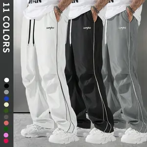 Men’s casual athletic pants, American striped quick-dry high-street parachute pants, fashionable loose-fit sports pants, breathable casual drawstring pants