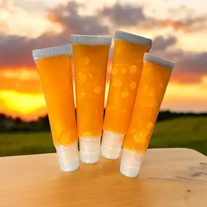 Orange lipgloss with cream smell Makeup