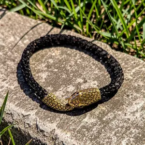 Savoro | Ouroboros serpent clasp | Viking weave