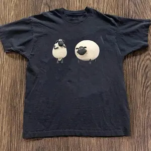 Gildan Shaun The Sheep Graphic Gildan T-Shirt, Unisex Vintage Graphic Tees Gothic Grunge Y2K Emo Scene Amity Affliction Style Clothes Men Women Streetwear