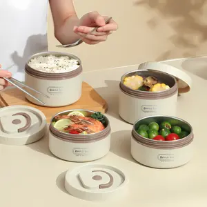 Portable insulated bento lunch box set made of premium 316 stainless steel—heated lunch container set, microwave safe, includes 420 ml and 620 ml three-compartment food boxes, beige durable multi-layer design, comes with an insulated bag and complete tabl