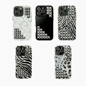 The phone case has a snow leopard print theme with 11-17 rhinestones