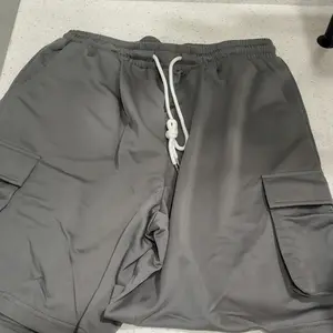 Men's Solid Color Tee & Drawstring Waist Shorts Two-piece Set, Regular Fit Breathable Soft Comfy Round Neck Short Sleeve T-shirt & Pocket Shorts Pj Set, Men's Casual Sleepwear for Summer