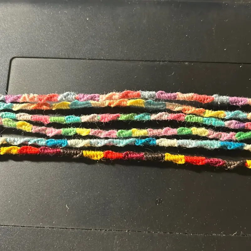 Tie on wishing bracelets in various color sets