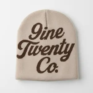 The Signature Beanie by 9ine Twenty Co. - Minimalist Logo Design, Cuff-less Knit, One-size-fits-all, Oat Milk with Espresso Logo