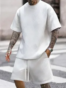 Men’s vacation beachwear set featuring jacquard fabric—a stylish, casual solid-color crewneck short-sleeve T-shirt paired with drawstring shorts; minimalist textured design that showcases personality and comfort.