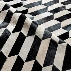 Figaro Black and White Patchwork Cowhide Rug