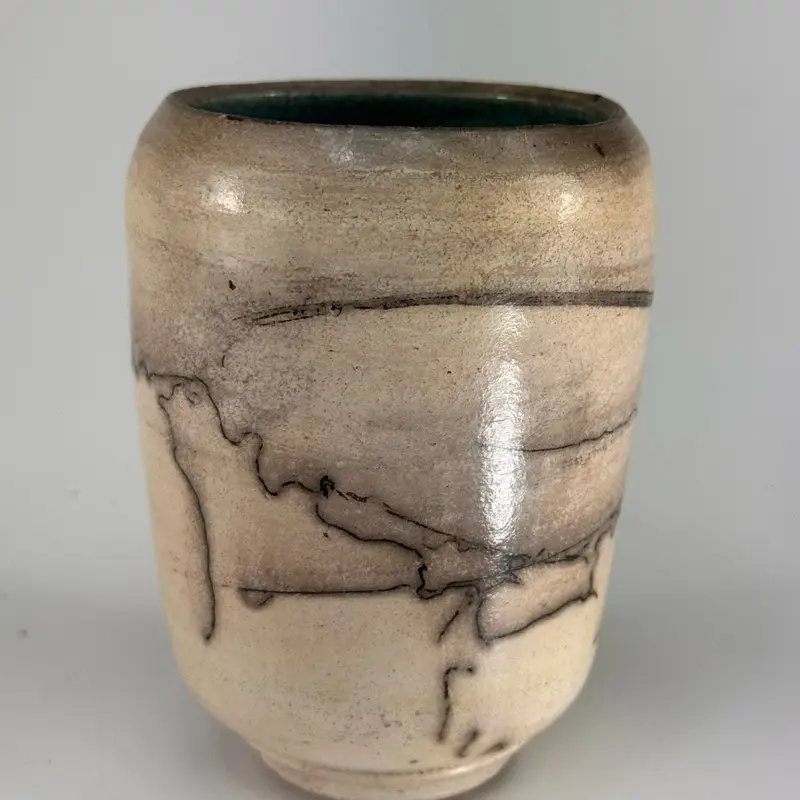 Handmade Horsehair Raku Pottery - Home Decor, Hand Burnished Exterior, waxed and polished. Coil Water Blue Glaze Reduction Interior.