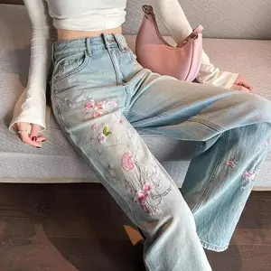 Women’s pink floral embroidered jeans for early autumn 2025; new Chinese high-waisted slim-fit wide-leg pants; washed light-colored straight-leg pants.