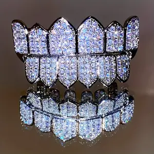 Golden Color Plated Glittering Hip Hop Cubic Synthetic Cubic Zirconiaia Teeth Grills - Top & Bottom Set for Rappers And Cosplayers - Premium Punk Tooth Caps, Instantly Transform Your Smile,  Party Costume, Statement Piece, Fashion Enthusiasts