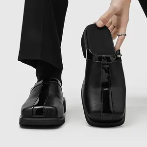 Men’s Black Patent‑Trim Square‑Toe Leather Mules. Glossy patent line creates cool accent, sleek square‑toe delivers mature minimalist vibe. Soft leather offers comfy wear, moderate block heel boosts leg‑lengthening effect