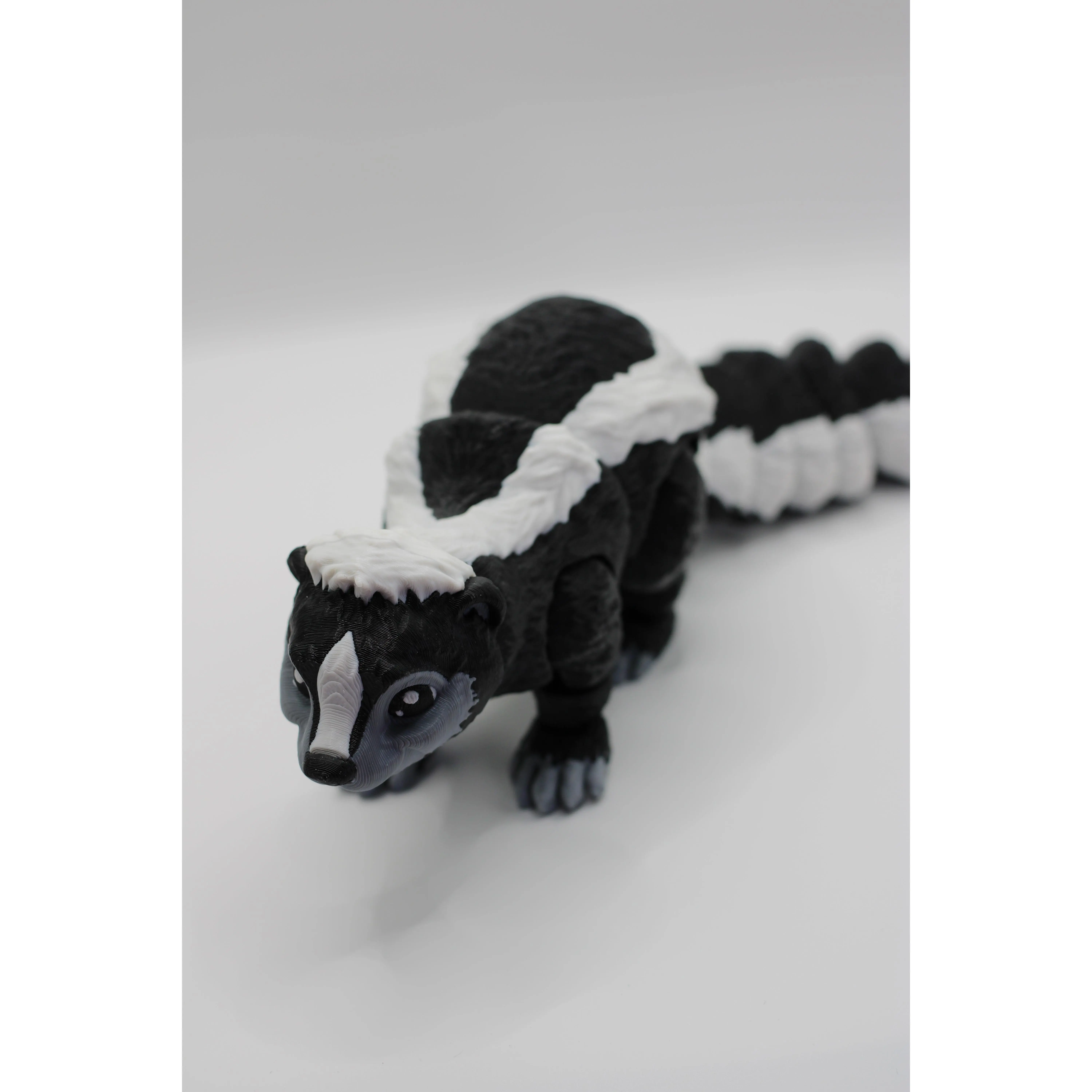Flexi skunk fidget - TikTok Shop